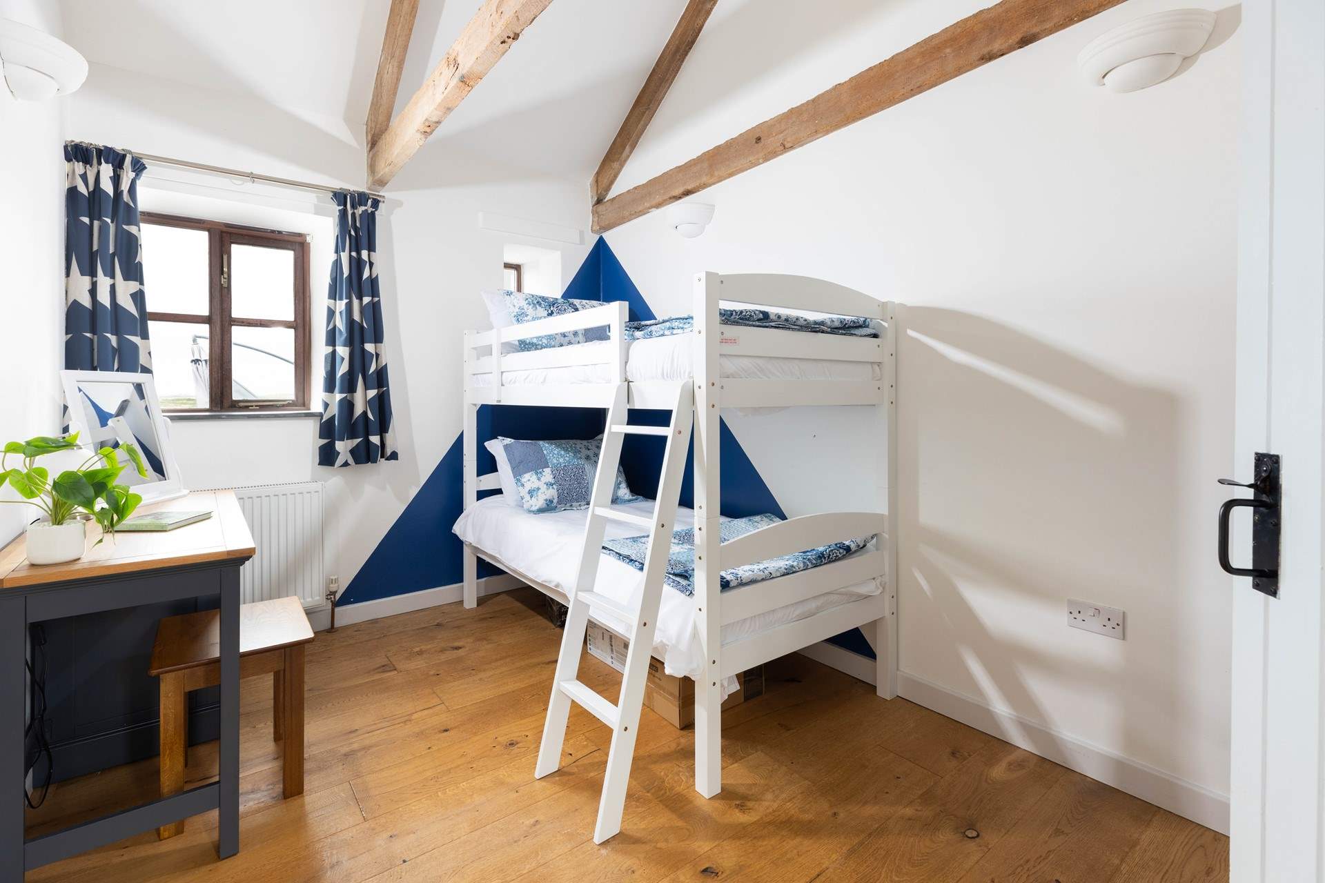 A room to delight the younger members of the party in these sweet bunk-beds in bedroom 2.