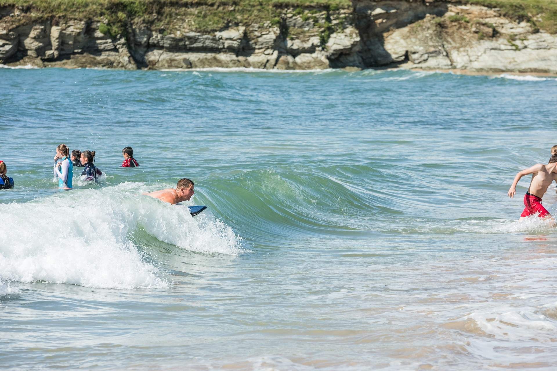 The turquoise waters of the West coast are perfect for body boarding.