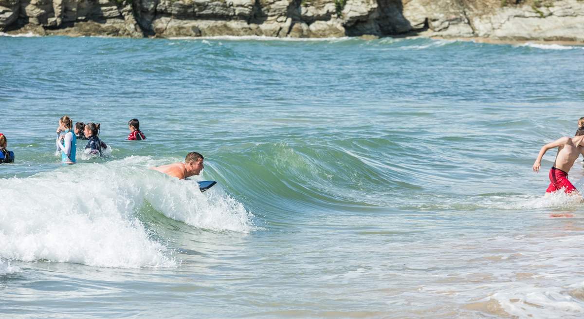 The turquoise waters of the West coast are perfect for body boarding.