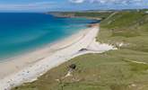 The stunning beach at Sennen is a surfers paradise, pack a picnic and have a perfect beach day. - Thumbnail Image