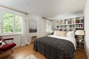 Snuggle under the covers of the king-size bed in the second bedroom.