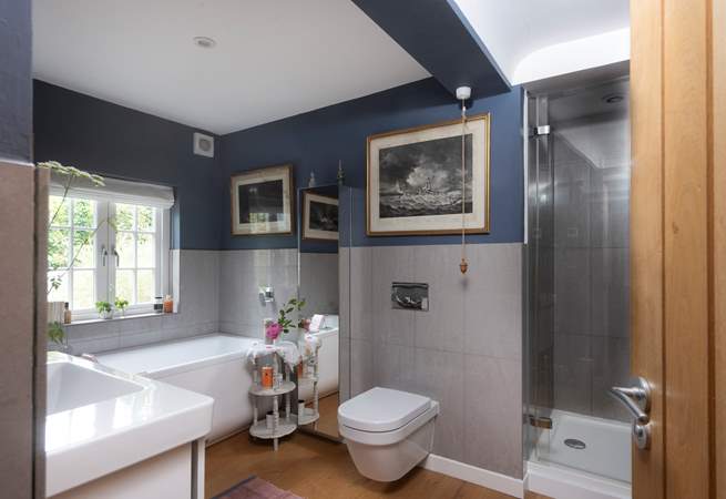 The main bathroom has a separate shower and bath.