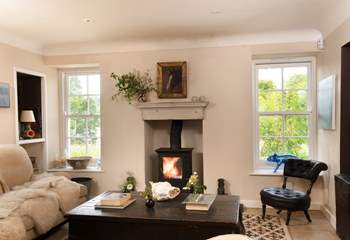 Cosy up with a book by the wood-burning stove.