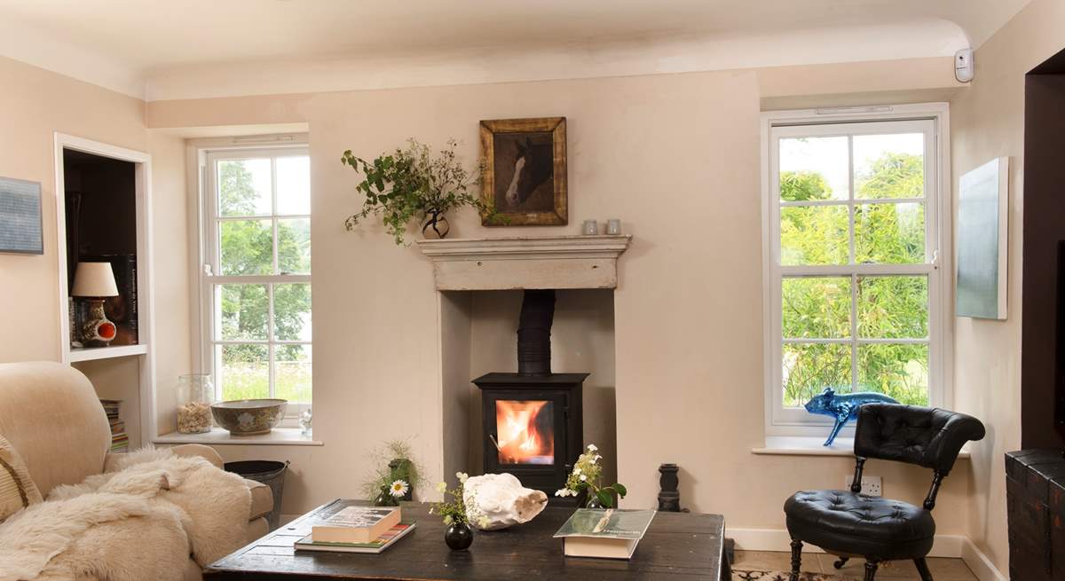 Cosy up with a book by the wood-burning stove.