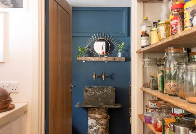 Leading off the kitchen is a pantry/utility-room and a beautifully crafted cloakroom. (Food not provided)
