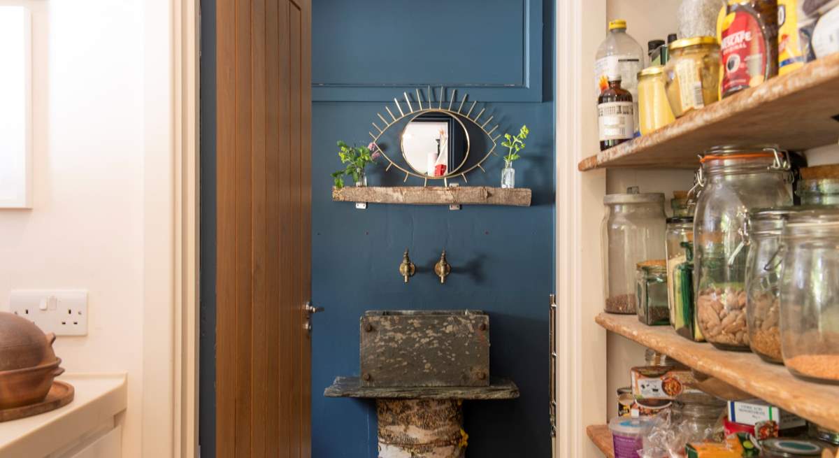 Leading off the kitchen is a pantry/utility-room and a beautifully crafted cloakroom. (Food not provided)