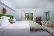 A huge emperor bed awaits the lucky guests who stay in this room.