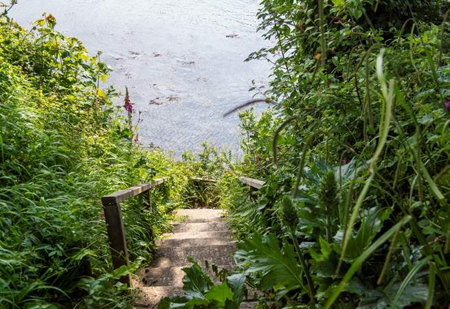 Steps lead down to your private quay.