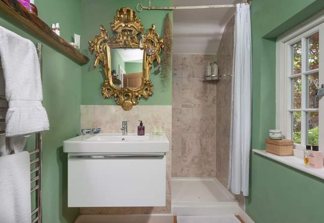There's sense of grandeur in the en suite shower-room.