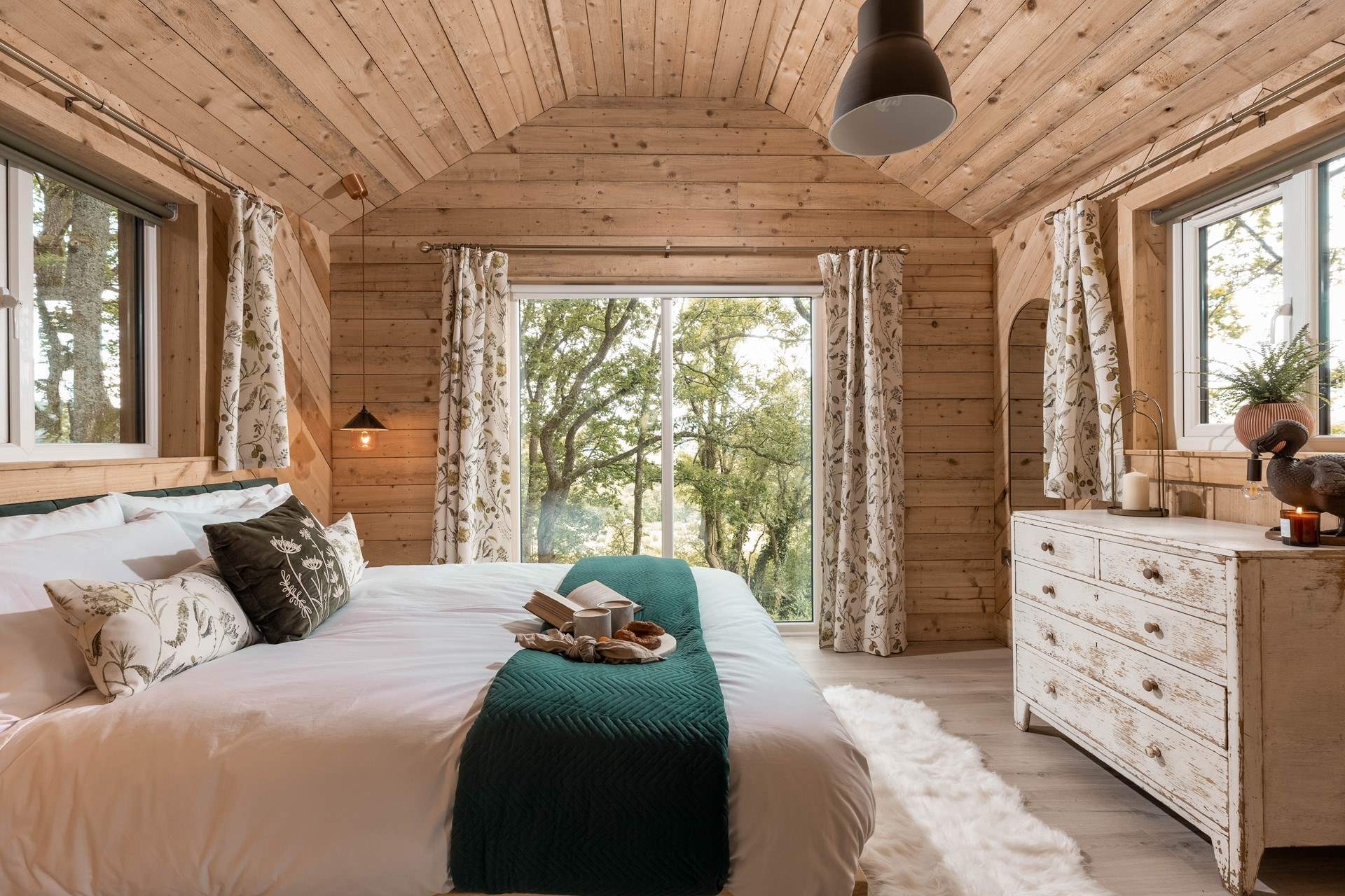 The luxurious king-sized bed was made for lazy lie-ins. 