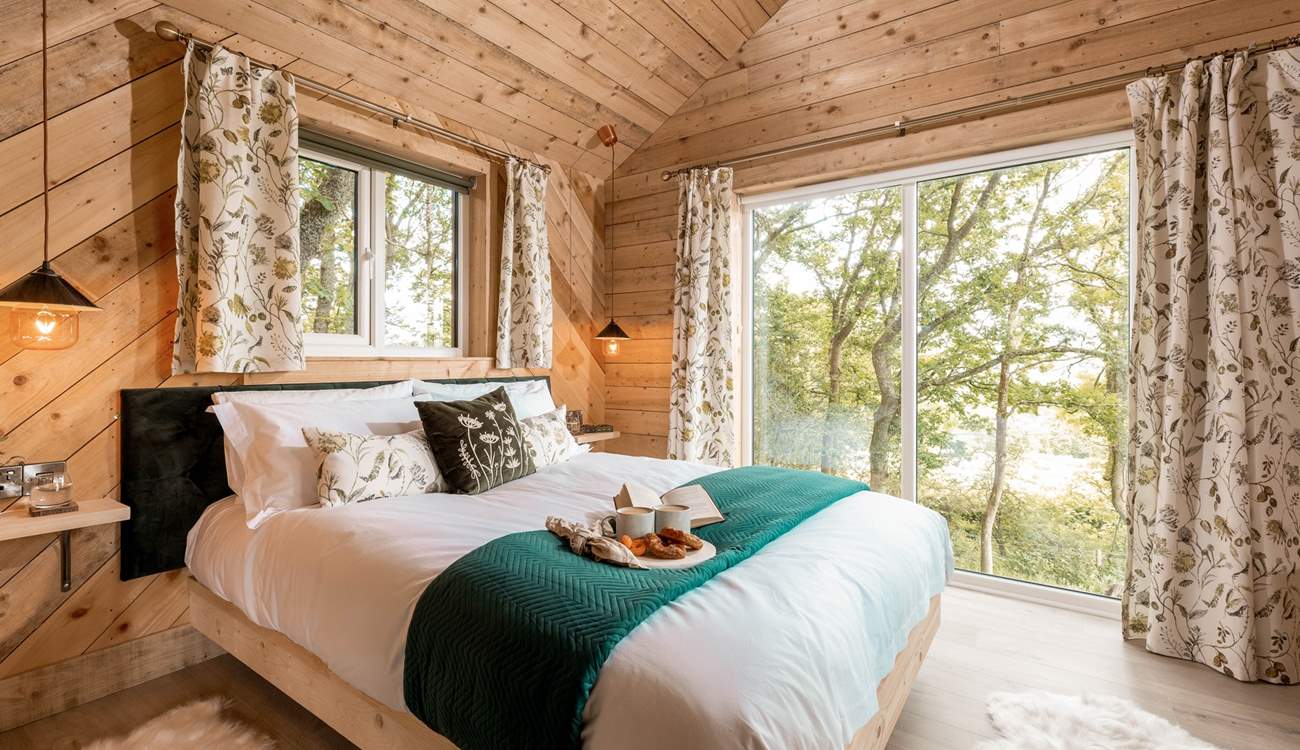 The luxurious king-sized bed was made for lazy lie-ins. 