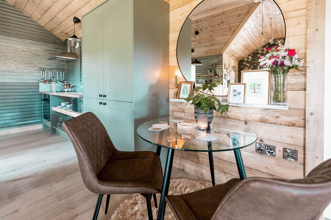 If the weather isn't so kind, enjoy a meal together at the dining-table.