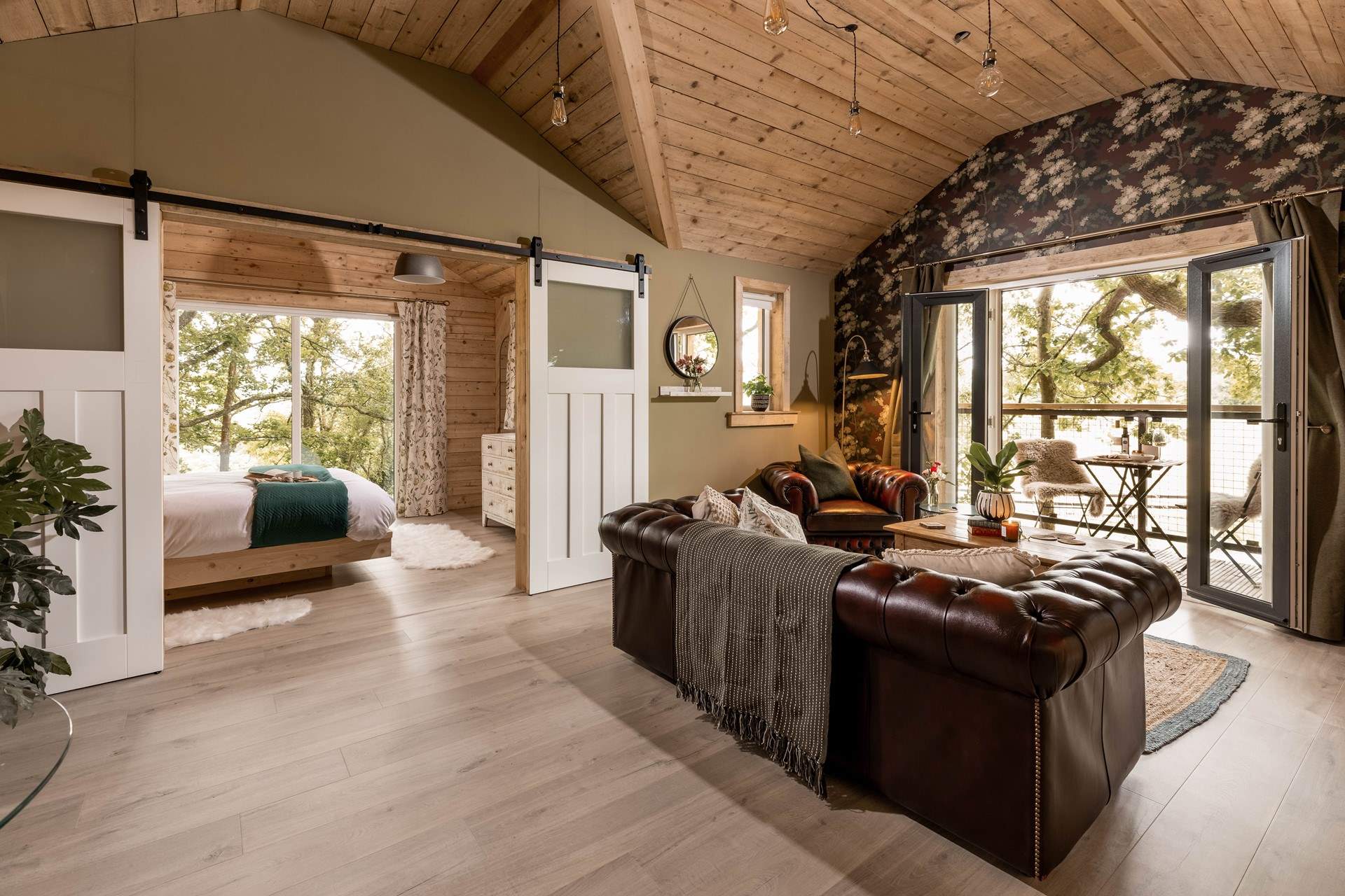 Your day can flow with complete ease at this handcrafted house amongst the trees.