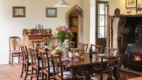 The original inglenook fireplace now has an inviting wood-burner.