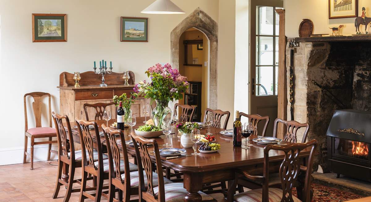 The original inglenook fireplace now has an inviting wood-burner.