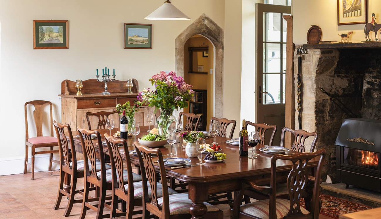 The original inglenook fireplace now has an inviting wood-burner.