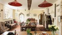 The wonderfully spacious dining-area has plenty of historical features.