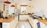 The kitchen adds a modern twist and the six door Aga is a lovely feature. - Thumbnail Image