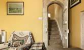 We just love the original narrow, stone arched doorways, more akin to what you might expect in a castle. - Thumbnail Image