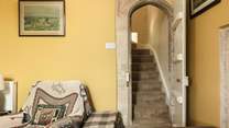 We just love the original narrow, stone arched doorways, more akin to what you might expect in a castle.