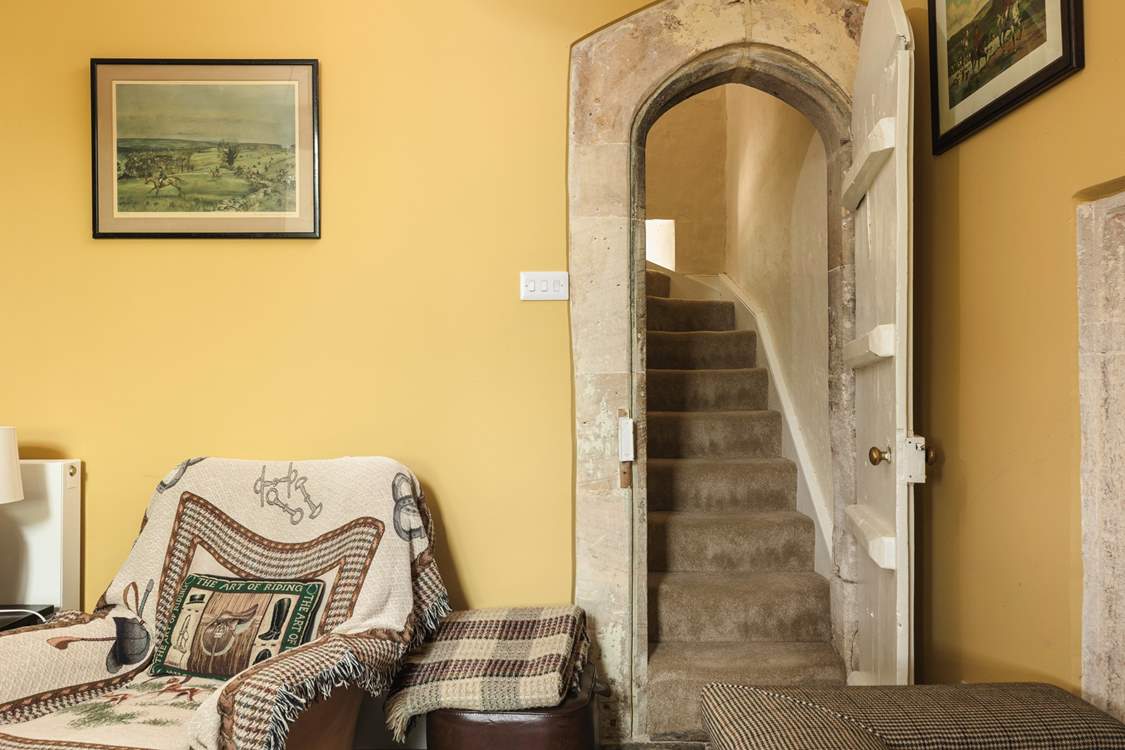 We just love the original narrow, stone arched doorways, more akin to what you might expect in a castle.