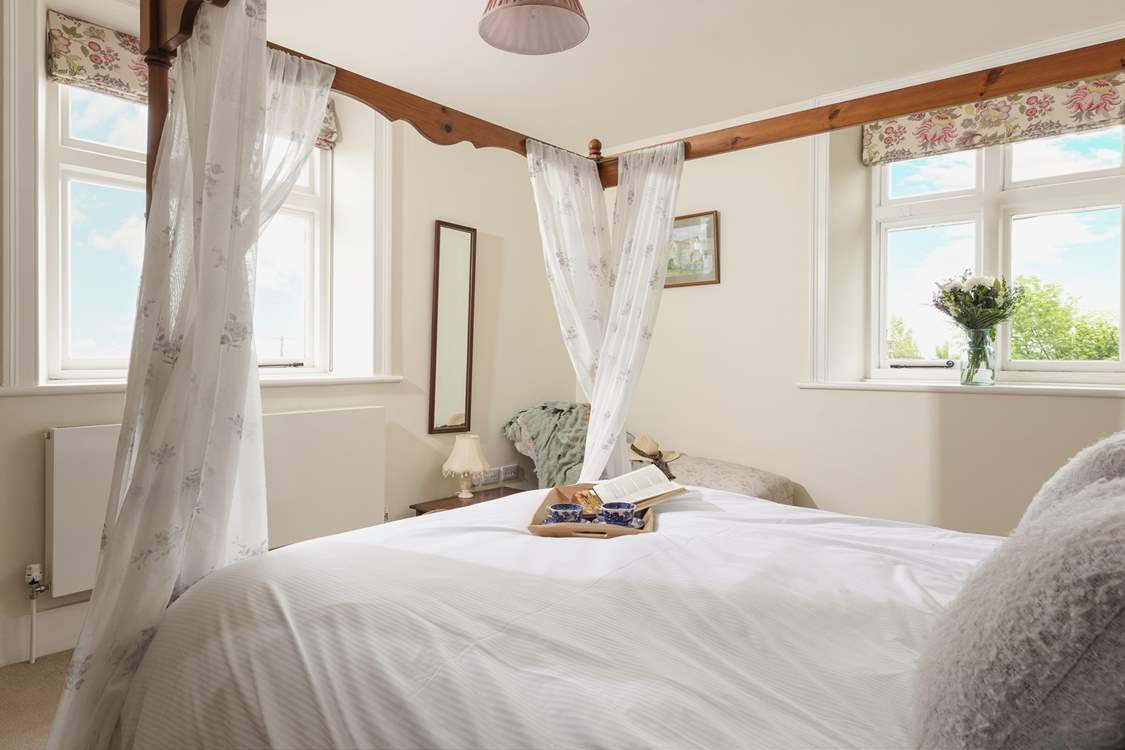 The double aspect windows offer delightful views of the gardens.