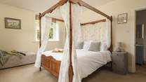 This dreamy bedroom will provide peace and solace, the perfect place to unwind.