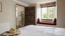 Check out the wonderful ancient doorway to the en suite.