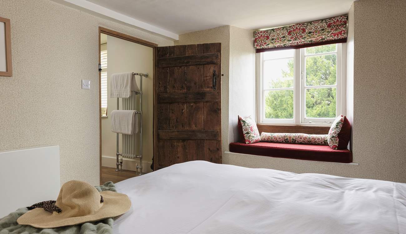 Check out the wonderful ancient doorway to the en suite.