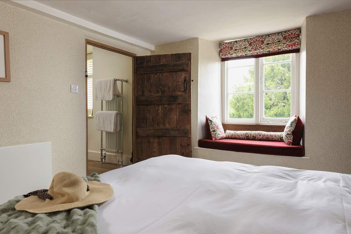 Check out the wonderful ancient doorway to the en suite.