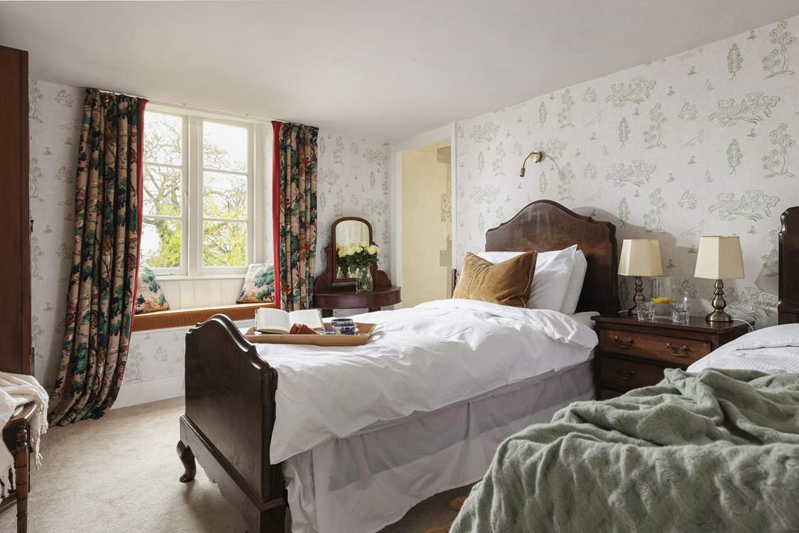 Another delightful window seat with views of the gardens.