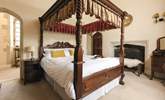 You'll sleep like a prince or princess in this beautiful four-poster bedroom. - Thumbnail Image