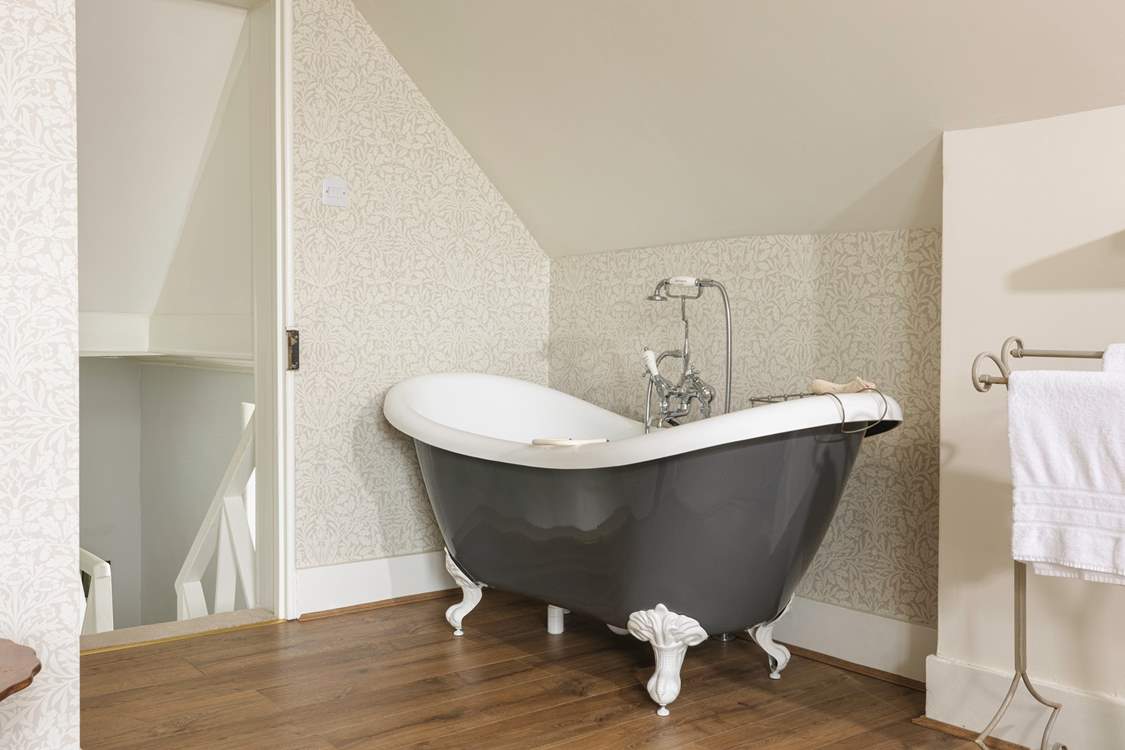 Relax in this luxurious free-standing bath.