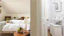 This room has its own private cloakroom.