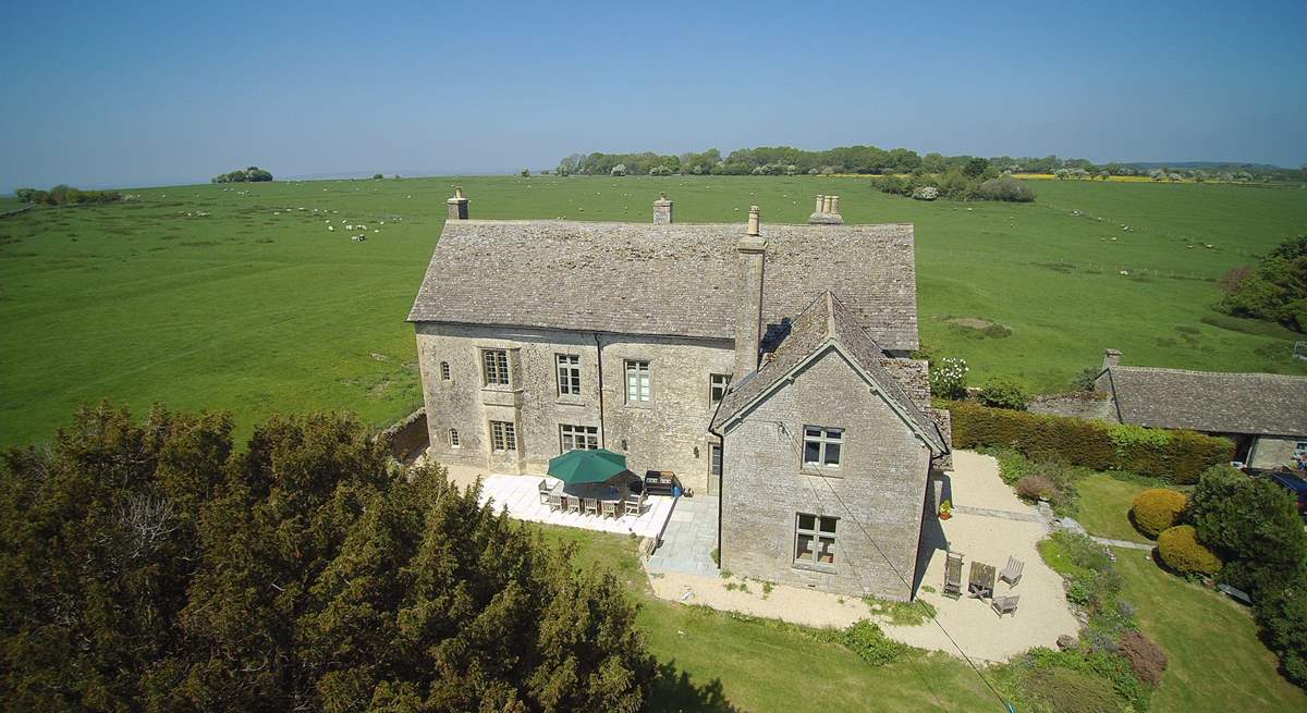 The western side of the property has the lovely outside dining-area, there is also additional seating towards the front.