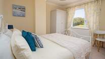 Sweet dreams in the rear facing room with garden views. 