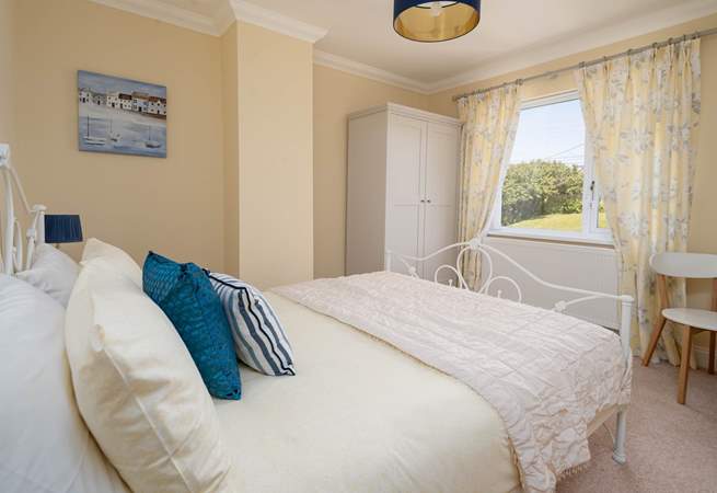 Sweet dreams in the rear facing room with garden views. 