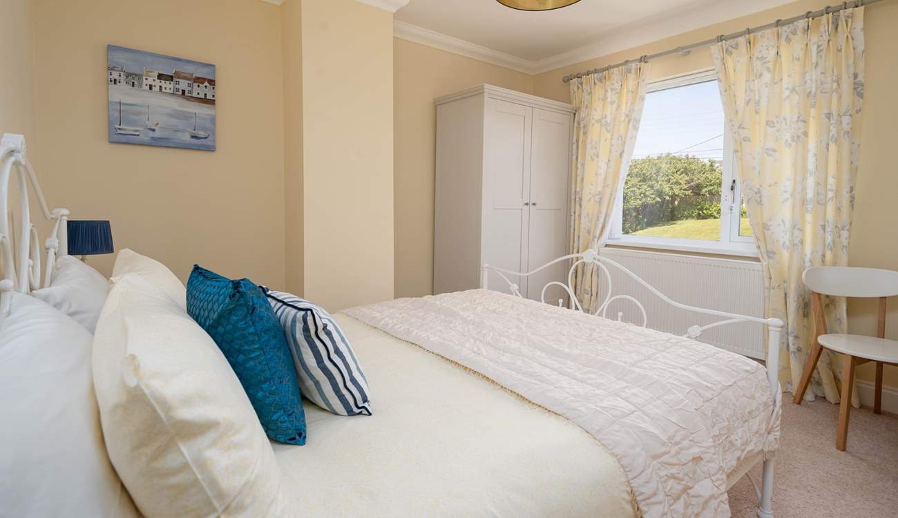 Sweet dreams in the rear facing room with garden views. 