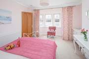 Pretty pink room with stunning sea views.