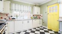 Love the 1950s yellow door. 