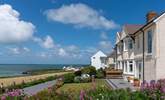 Spot the dolphins from High Cliff or soak in the luxurious hot tub. A wonderful coastal holiday awaits in this stunning coastal home.  - Thumbnail Image