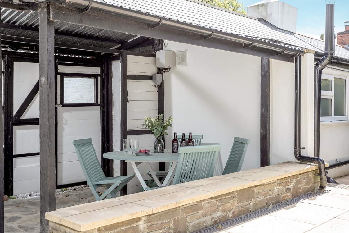 The sunny courtyard is the perfect spot for al fresco dining.