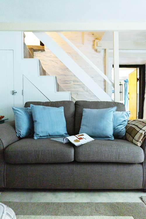 Comfy sofa to relax after a day exploring.