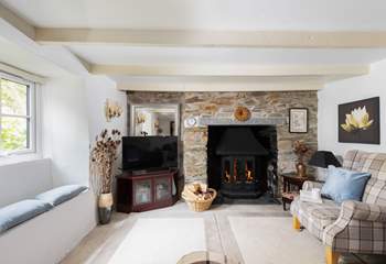 The pretty window seat, exposed beams and painted stonework add to the overall character of Rivendell Cottage.