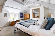 The vaulted ceiling gives a wonderful sense of space in Bedroom 1.