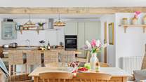 Such a light and bright entertaining space.