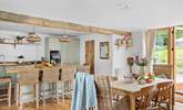 Plenty of space to dine. Pull up a chair at the breakfast-bar and enjoy a chilled glass of wine as lunch is prepared, or relax around the farmhouse table with a leisurely supper. - Thumbnail Image