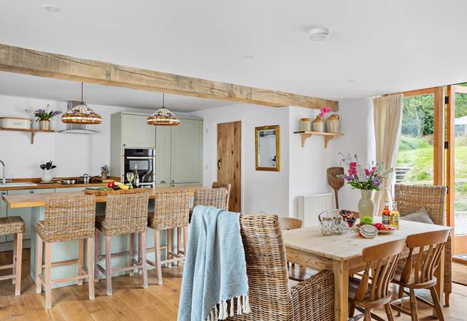 Plenty of space to dine. Pull up a chair at the breakfast-bar and enjoy a chilled glass of wine as lunch is prepared, or relax around the farmhouse table with a leisurely supper.