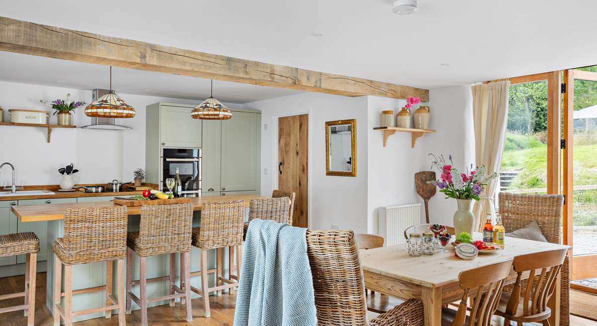 Plenty of space to dine. Pull up a chair at the breakfast-bar and enjoy a chilled glass of wine as lunch is prepared, or relax around the farmhouse table with a leisurely supper.