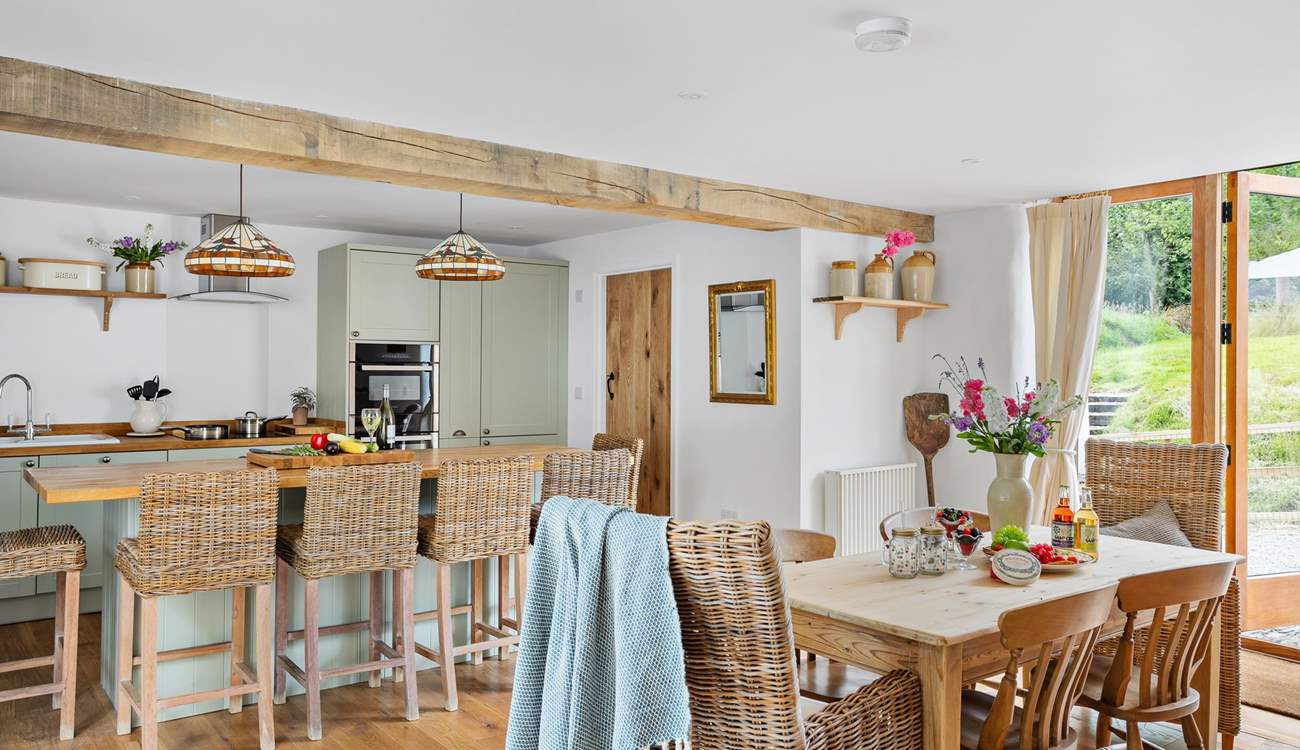 Plenty of space to dine. Pull up a chair at the breakfast-bar and enjoy a chilled glass of wine as lunch is prepared, or relax around the farmhouse table with a leisurely supper.